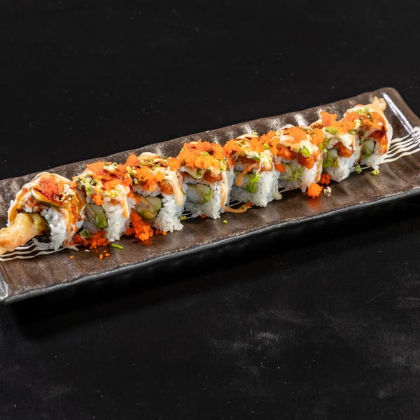 A plate of eight Express Sushi & Teriyaki sushi rolls, topped with orange roe and white sauce.